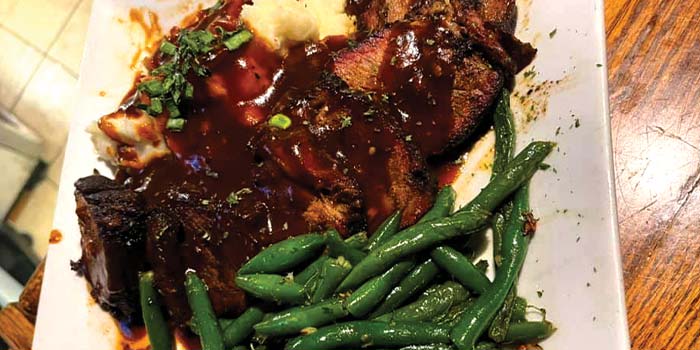 Delicious short rip dinner served with green beans and mashed potatoes at Cheers Grille & Bar in Concord NH. Check out the rest of our lunch and dinner menu!