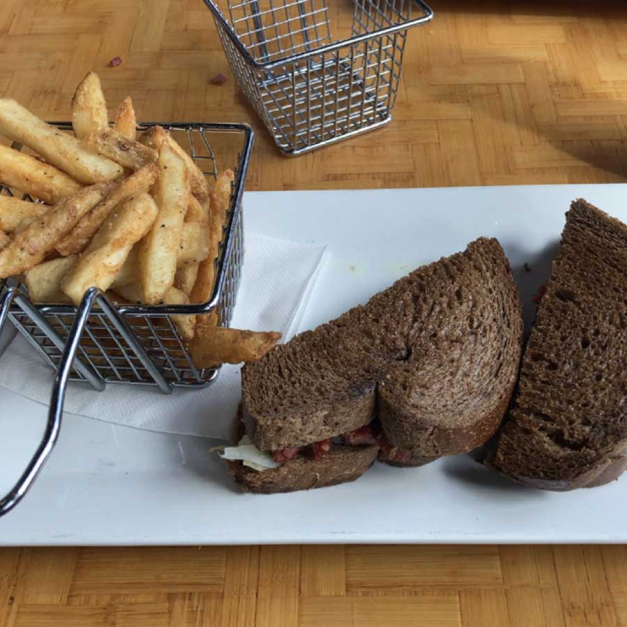 Sandwich and Fries Share a Meal at Cheers Bar and Grill in Concord, CT