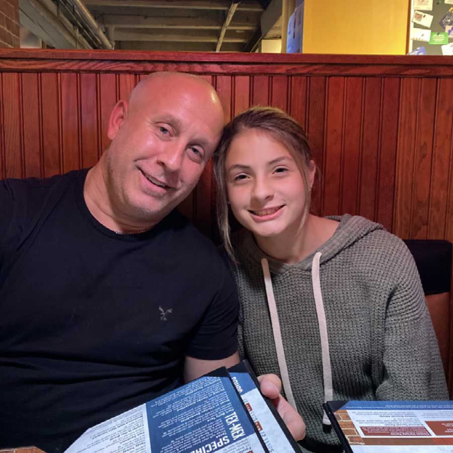 Patrons Share a Meal at Cheers Bar and Grill in Concord, CT