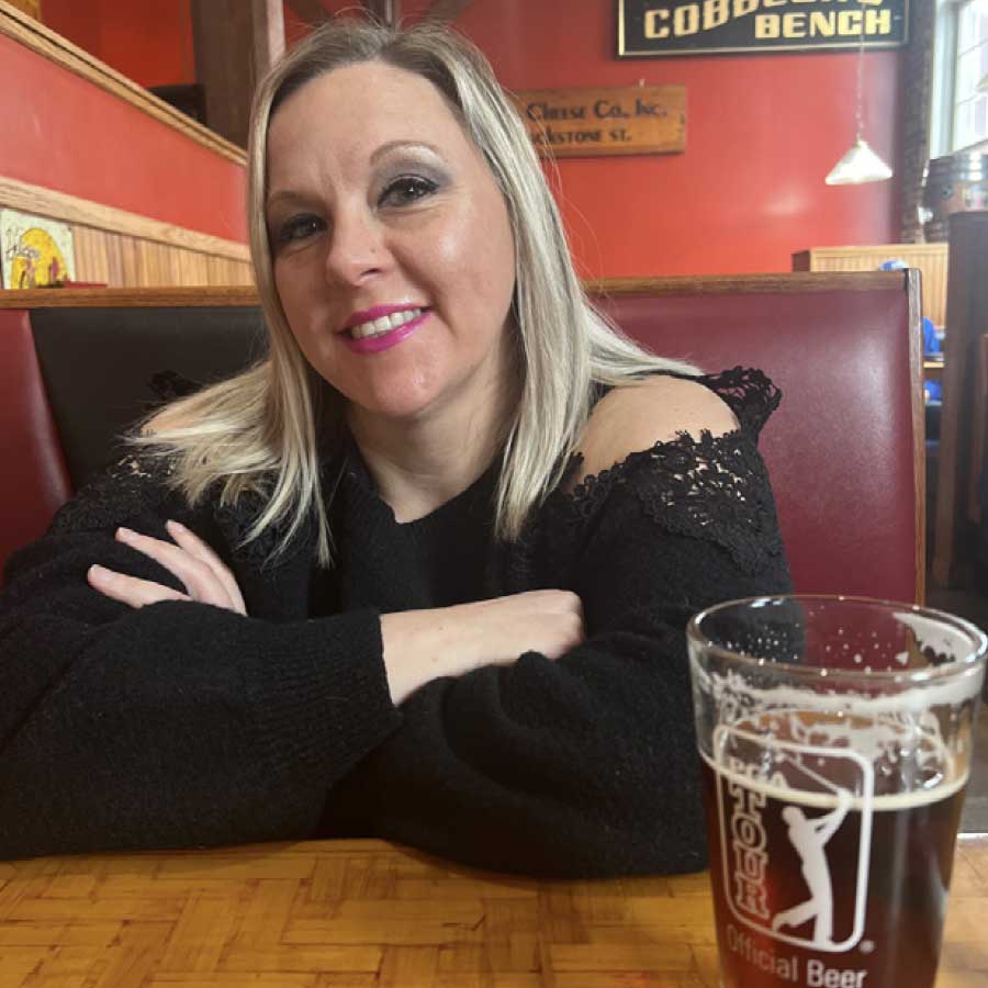 Lady enjoying a refreshing beverage for Share a Meal at Cheers Bar and Grill in Concord, CT