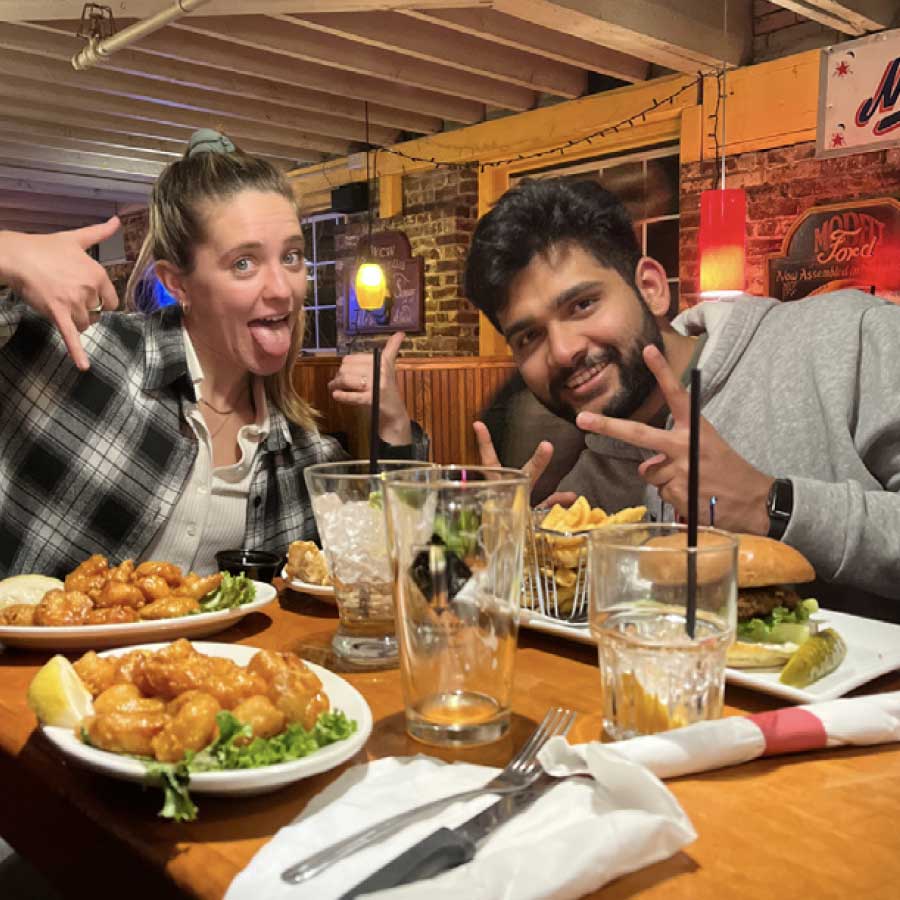 People eating a meal for Share a Meal at Cheers Bar and Grill in Concord, CT